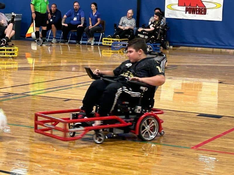 Alex in his power soccer chair