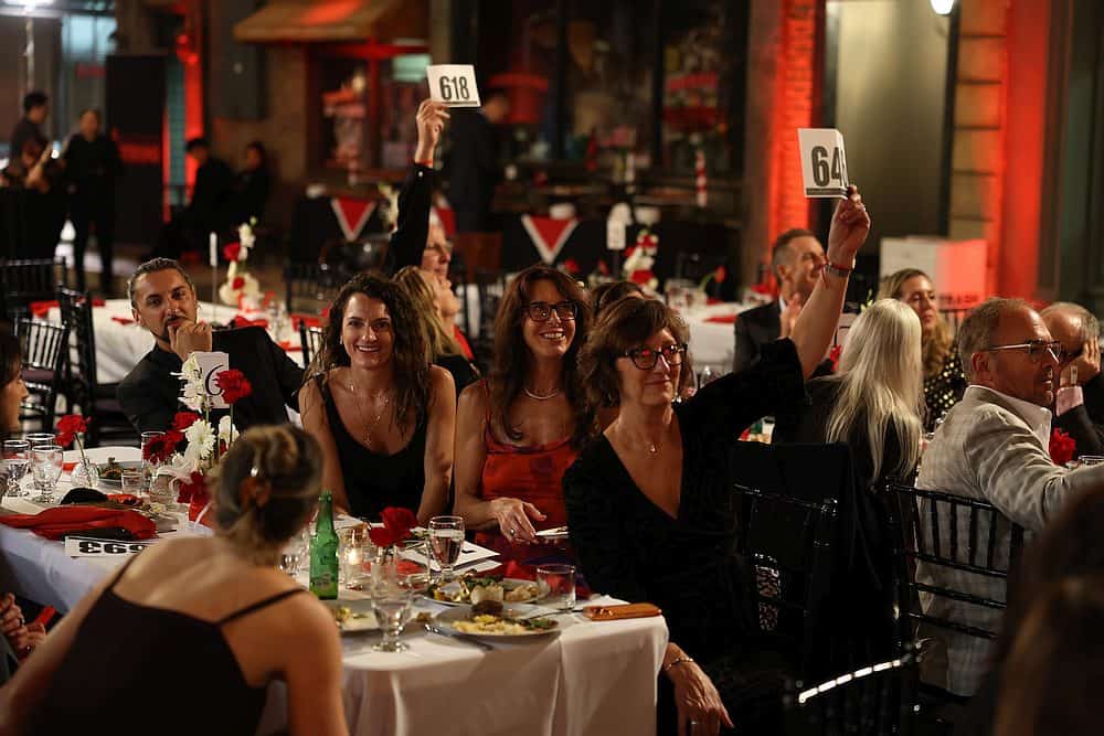 Auction bidders at the gala